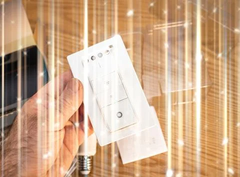 Hand Holding Smart Light Switch with Digital Glow Illustration