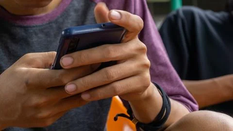 Hand holding smart phone. Using smart phone for chat Stock Photos