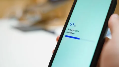 Hand holding smartphone with app summarizing document and showing document too Stock-Footage 342810933