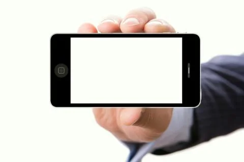 Hand holding smartphone with a blank screen Stock Photos