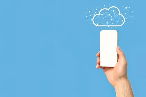 Hand holding smartphone with cloud and network icons Fotos Stock