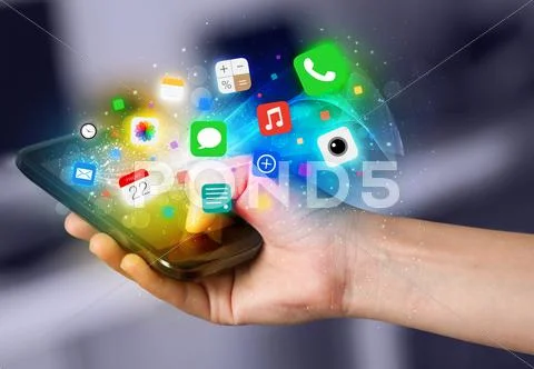 Hand holding smartphone with colorful app icons Stock Photos