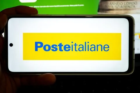 Hand holding smartphone displaying poste italiane services Stock Photos