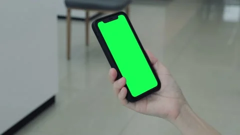 Hand holding smartphone Stock Footage 219531090