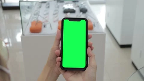 Hand holding smartphone Stock Footage 219531124