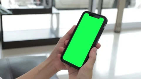Hand holding smartphone Stock Footage 219531132