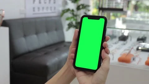 Hand holding smartphone Stock Footage 219531143