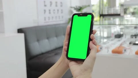 Hand holding smartphone Stock Footage 219531144