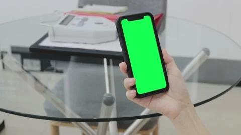 Hand holding smartphone Stock Footage 219531145