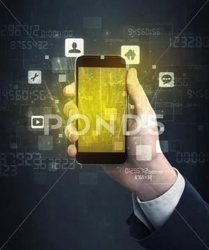 Hand holding smartphone with golden screen Stock Photos