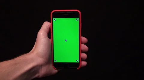 Hand holding smartphone with green scree... | Stock Video | Pond5