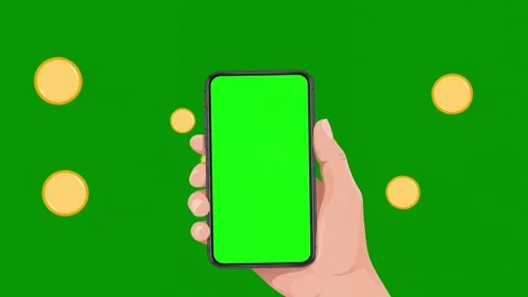 Hand holding smartphone with green screen and falling gold coins Stock Footage 339830689