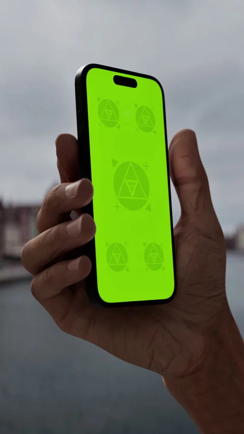 A hand holding a smartphone in a large Stock Footage 293568211