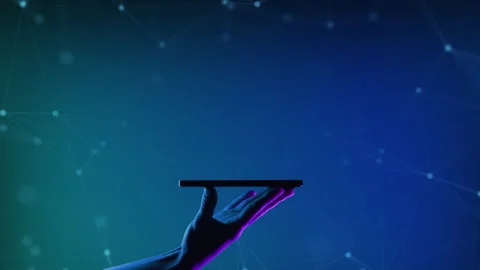 A hand holding smartphone on the neon light background. Mobile application or Stock Footage 263069360