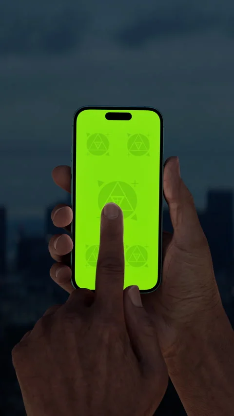 A hand holding a smartphone at night Stock Footage 295209712