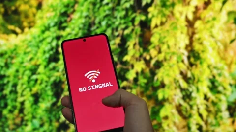 A hand holding a smartphone with no no signal Stock Footage 340510052