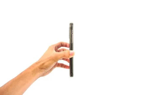 Hand holding smartphone side view isolated on white background Foto stock