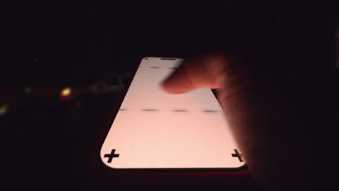 Hand Holding Smartphone with Tracking Marks While Swiping Screen Sideways and Stock Footage 320723021