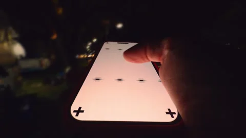 Hand Holding Smartphone with Tracking Marks While Swiping Horizontally on Screen Stock Footage 320733782