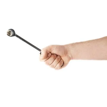 Hand holding a socket wrench tool, composition isolated over the white Stock Photos