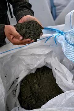 Hand Holding Soil Sample  Construction Material 스톡 사진
