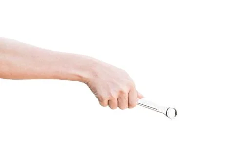 Hand holding a spanner isolated on a white background with clipping path. Stock Photos