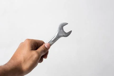 Hand Holding Spanner Foto stock