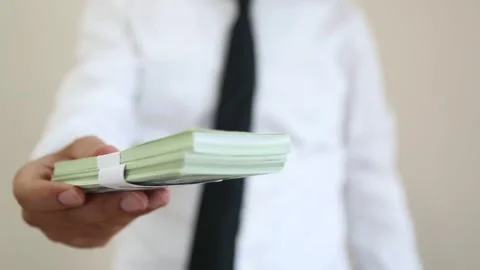 Hand Holding Stack of Cash Stock Footage 340901392