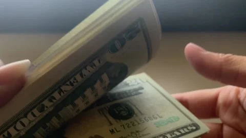 Hand Holding Stack of Money Video stock 132551862
