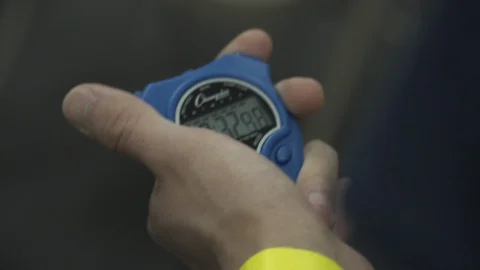 Hand Holding Stopwatch Stock Footage 112156613