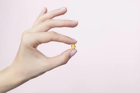 Hand holding the supplements Stock Photos