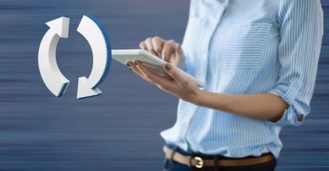 Hand holding tablet with 3D refresh arrows icon Stock Photos