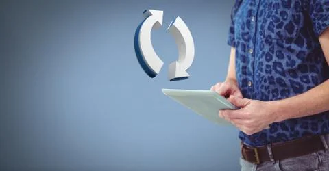 Hand holding tablet with 3D refresh arrows icon Stock Photos