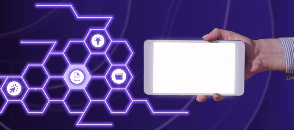 A Hand Holding A Tablet Beside A Pattern With S Presenting Crucial Data In An Foto stock