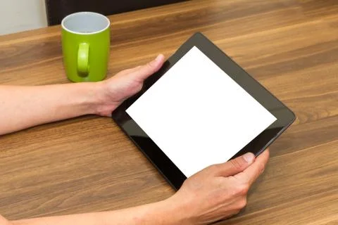 Hand Holding Tablet with Blank Screen Stock Photos