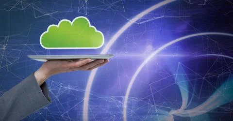 Hand holding tablet with cloud icon and technology background Stock Photos