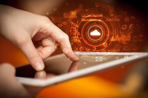 Hand holding tablet with cloud system concept Stockfoto's