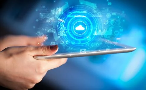 Hand holding tablet with cloud system concept Foto stock