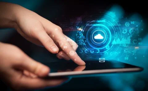 Hand holding tablet with cloud system concept Foto stock