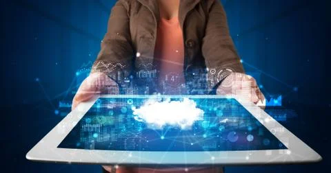 Hand holding tablet with cloud technology concept Foto stock