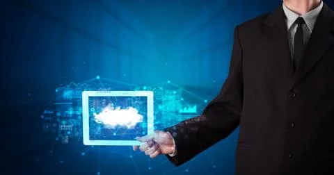 Hand holding tablet with cloud technology concept Foto stock