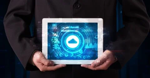 Hand holding tablet with cloud technology concept Stockfoto's