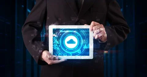 Hand holding tablet with cloud technology concept Stockfoto's