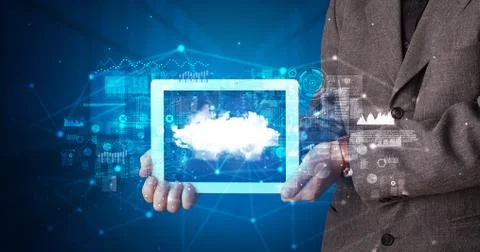 Hand holding tablet with cloud technology concept Foto stock