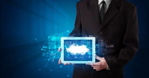Hand holding tablet with cloud technology concept Foto stock
