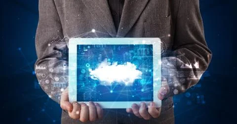 Hand holding tablet with cloud technology concept Foto stock