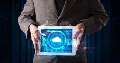 Hand holding tablet with cloud technology concept Foto stock