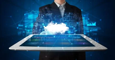 Hand holding tablet with cloud technology concept Foto stock