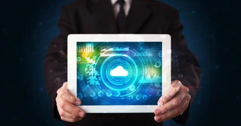 Hand holding tablet with cloud technology concept Foto stock