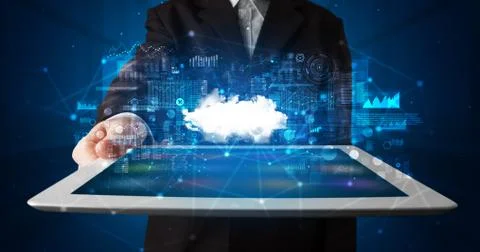 Hand holding tablet with cloud technology concept Foto stock